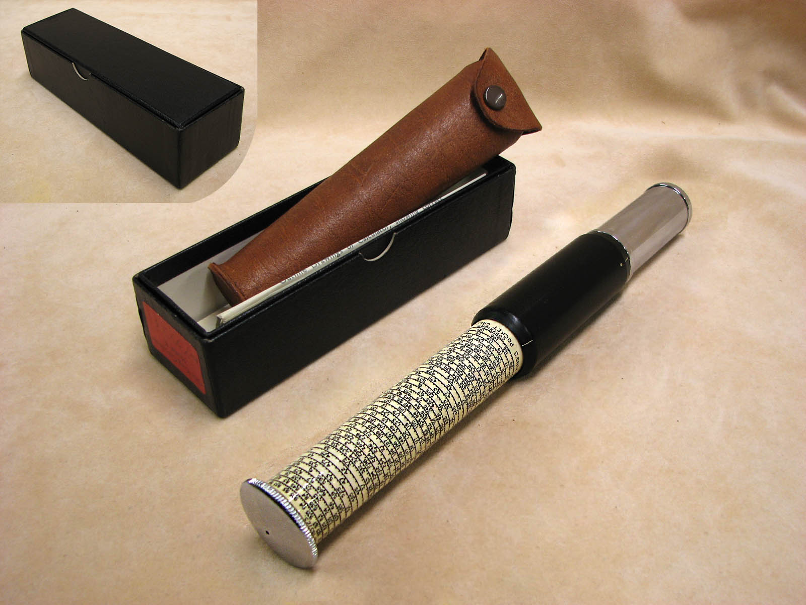 1960's Otis King Model K type C leather cased cylidrical slide rule calculator